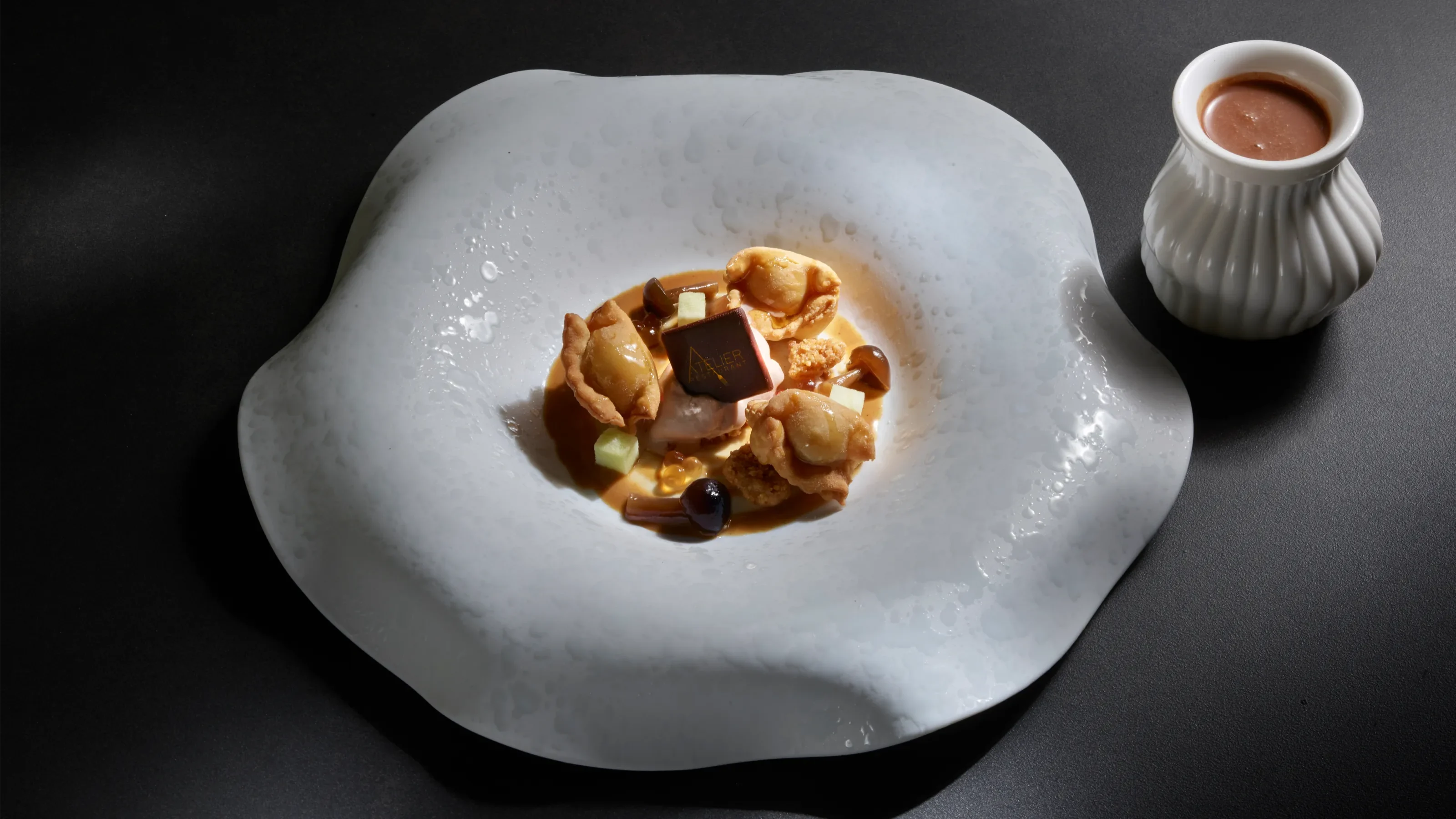 Piatto gourmet dell'Atelier Restaurant, 1 Stella Michelin